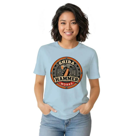Cool Vintage Hammer Gear Badge Shiba T-Shirt For True DIY Guys Who Love Garage Art Retro Distressed Look Unisex Style With Bold Design on a woman in light blue.