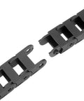 Close-up of a Closed Drag Chain Cable Carrier With End Connectors R18 10x15mm Inner Size, black plastic, showing connection detail.