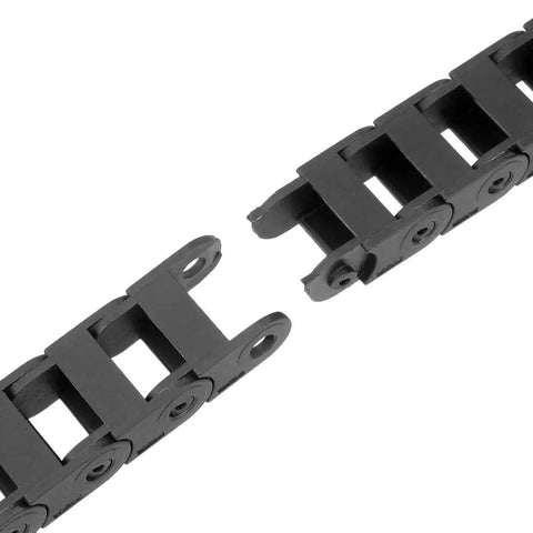 Close-up of a Closed Drag Chain Cable Carrier With End Connectors R18 10x15mm Inner Size, black plastic, showing connection detail.