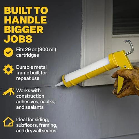 Caulk gun with yellow body loaded with white 29 oz cartridge; gloved hand holding it, ladder hook visible.