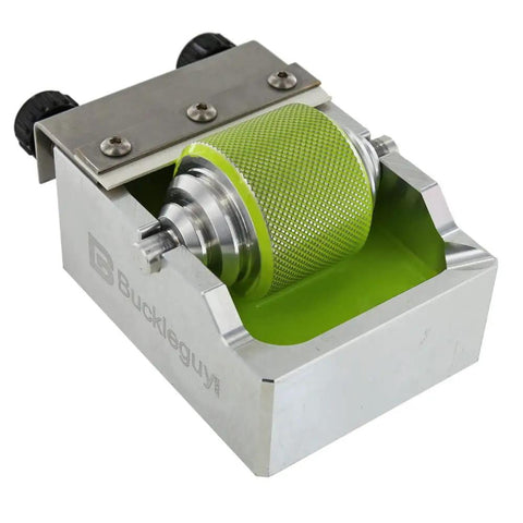 Heavy Duty Aluminum Leather Edge Paint Roller Featuring Spring Loaded Tension Knurled Handle For Tweaking Pressure And Knocking Out Killer Leather Finishes Fast in silver with green roller.