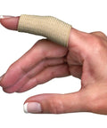 Finger wearing beige sleeve for pain relief, compression for arthritis and tendonitis, flexible plastic wrap, assorted sizes, 12 count.