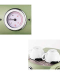 Close-up of gauge and cup warmer from fully automatic and semi automatic espresso coffee machine with retro design for home or small biz pump driven strong steam and milk froth green color easy auto and manual modes great for lattes cappuccinos and more.