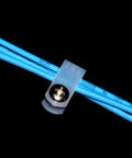 White Nylon R Type Cable Clamps One Quarter Inch 200 Piece Cable Organizer Kit securing blue wires with a metal screw