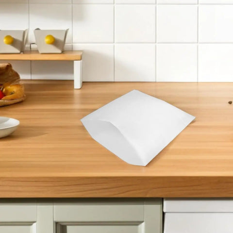 Pro Grade White EPE Foam Moving Pouches For Glassware And Dishes on kitchen counter, protective packing wrap for fragile items.