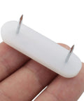 Close-up of 50 Pack Nail On Chair Sliders With Plastic Head For Hardwood Floors, PTFE Thick Pad Floor Protectors, Double Needle Pins
