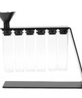 Glass Coffee Bean Storage Tubes Set Of Six With One Way Degassing Valve And Magnetic Stand And Single Dose Espresso Dosing Vials, transparent vials in a black stand.