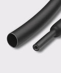 Close-up of black heat shrink tubing from Heat Shrink Tubing Kit 328 Piece Assortment For Electrical Insulation And Wire Protection