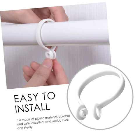 Close-up of hands installing white plastic curtain ring on rod, part of 60 Pack Plastic Curtain Rings For Rods Thick Durable Construction