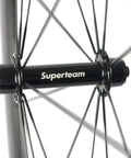 Close-up of hub and spokes from 50mm 23mm Carbon Road Wheelset 700c Clincher For Aero Performance, Matte 3K Braking Surface, Lightweight