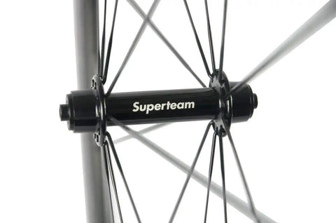 Close-up of hub and spokes from 50mm 23mm Carbon Road Wheelset 700c Clincher For Aero Performance, Matte 3K Braking Surface, Lightweight