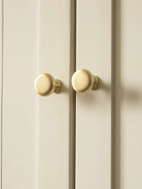 2 Pack Brushed Gold Cabinet Knobs Set Vintage Retro Drawer Pulls installed on light-colored cupboard doors.