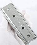 Heavy Duty Metal Sofa Connectors 4.7 Inch Interlocking Hangers Wall Mount Brackets for Sectional Couch and Bed Frame shown in hand.
