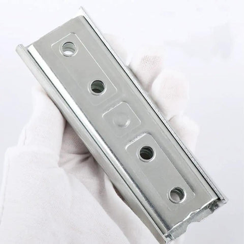 Heavy Duty Metal Sofa Connectors 4.7 Inch Interlocking Hangers Wall Mount Brackets for Sectional Couch and Bed Frame shown in hand.