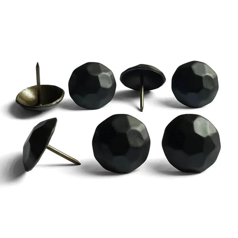 Sixty Piece Bundle Of Hella Sturdy Matte Black Upholstery Tacks featuring a slick one inch round head for easy installation.