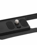 Close-up of bottom view of Wood Handle Metal Camera Cage for ZFC With Vertical Rig Design Cold Shoe Mount And Multiple One Quarter Inch And Three Eighths Inch Screw Holes For Attaching Top Handles Monitors And Tripods.