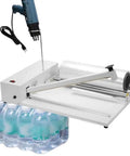 Heavy Duty Shrink Wrap Machine Sealer For POF And PVC Film With Heat Gun And 9 Temp Levels sealing water bottles on a workbench.
