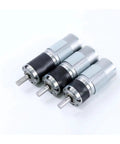 Heavy Duty 42mm Planetary Gear Motor With 775 Brushed DC Drive, three compact motors showcasing strong torque design.