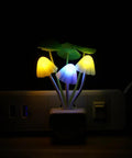 Sensor Led Night Light With Color Changing Plug In Mushroom Dream Bed Lamp Three Color Blue Yellow White Warm Soft Romantic Ambient Glow For Bedroom Nightstand Or Cozy Decor, showing glowing mushrooms on a power strip