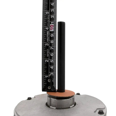 Close-up of HVAC Condenser Motor Replacement 0.25 HP, 1 Phase, 208-230V, 825 RPM Model Specific shaft with measuring tape.