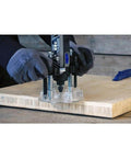 Dremel 335-01 plunge router attachment for rotary tool with clear base plate on wood
