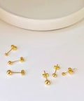 14K Gold Plated Ball Stud Earrings Set for Multiple Piercings High Polish Finish Hypoallergenic Round Ball Studs in 3Mm 4Mm 5Mm Sizes Cute Everyday Jewelry Trio for Women, gold studs on white surface