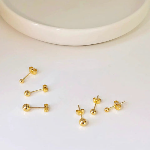14K Gold Plated Ball Stud Earrings Set for Multiple Piercings High Polish Finish Hypoallergenic Round Ball Studs in 3Mm 4Mm 5Mm Sizes Cute Everyday Jewelry Trio for Women, gold studs on white surface