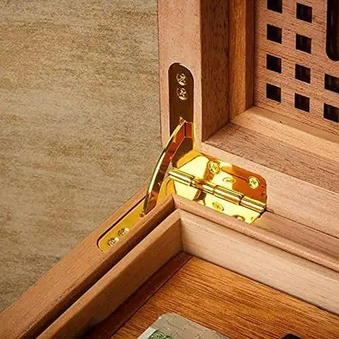 Antique 31x30mm 90 Degree Spring Hinge Set installed in wooden box corner, showcasing sturdy gold finish for furniture cabinets and jewelry boxes.