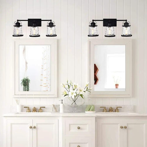 Black 3 Light Industrial Vanity Sconces with Hammered Glass Shades over bathroom mirror, vintage rustic farmhouse style.