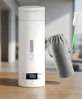 Premium No Sweat 500 Ml Portable Electric Kettle With Smart Temp Control and Crisp LCD Display on a wooden table.