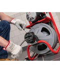 Using Heavy Duty 115 Volt Electric Conduit Bender Machine Featuring Autofeed and C45 Integral Wound Cable to bend rigid pipe.