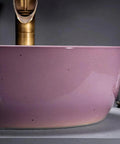 Close-up of 41Cm Dia Round Art Basin Bathroom Counter Basin Pink Color with smooth porcelain finish and modern design.
