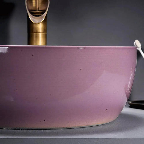 Close-up of 41Cm Dia Round Art Basin Bathroom Counter Basin Pink Color with smooth porcelain finish and modern design.