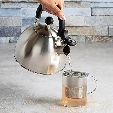 Whistling Stovetop Tea Kettle With Food Grade Stainless Steel, 1.5 Quart Capacity, Boils Fast, No Waiting, Cool Touch Folding Handle in use