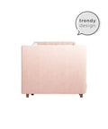 Side view of Valentina Twin Upholstered Daybed With Trundle In Pink Velvet showing soft plush look and sturdy plastic legs.