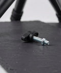 Dang Dependable M4 M5 M6 Tee Wing Bolt Knob Set for secure tripod mounts, black thumb screw on slate surface.