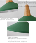 Close-up of KCEYANB Adjustable Height Pendant Light Modern Simplicity Metal Hanging Lamp with green shade and wood holder.