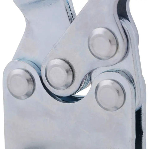 Close-up of a heavy duty horizontal toggle clamp pivot mechanism for welding and woodworking.