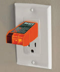 Outlet tester plugged into wall socket, part of Non Contact Voltage Tester With Outlet Tester Dual Range 12 To 48V AC And 48 To 1000V AC