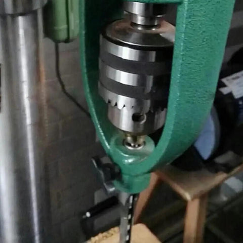 Close-up of Rock Solid Portable Drill Press Square Tenon Converter, showing heavy steel housing and precision drilling components.