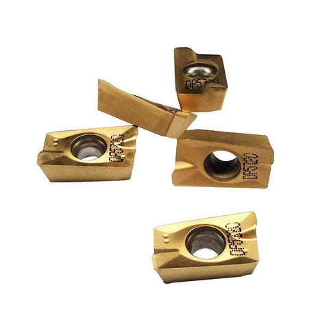 Five gold APMT1604 carbide turning inserts with central through-holes.