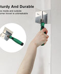Person using Pro Grade Drywall Corner Tool With Non Slip Handle Stainless Steel Angled Corner Trowel For Plastering