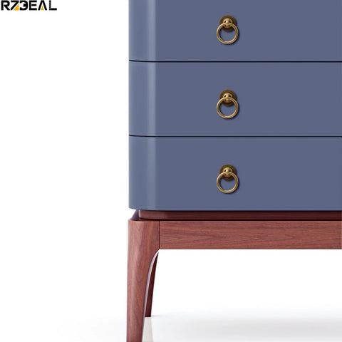 Blue dresser with 4 Pack Solid Antique Brass Cabinet Ring Pulls Set For Drawers And Cabinets installed on drawer fronts, side view