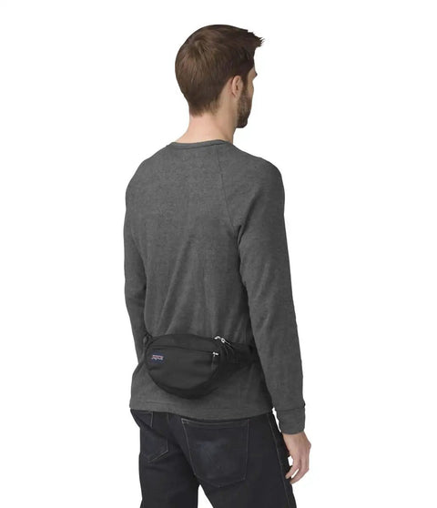 Man wearing Fifth Avenue Fanny Pack Crossbody Bag For Women And Men, Durable Go-To Waist Bag with Adjustable Belt, Black, rear view