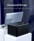 Premium 3.5 Inch 5 Bay USB 3.1 Type C RAID HDD Enclosure Loaded With Silent Aluminum Cooling Fan For Your Massive 80TB Storage Beast Plug And Play Setup Easy As Pie Rock Solid Docking Station next to a laptop on a table.