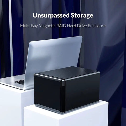 Premium 3.5 Inch 5 Bay USB 3.1 Type C RAID HDD Enclosure Loaded With Silent Aluminum Cooling Fan For Your Massive 80TB Storage Beast Plug And Play Setup Easy As Pie Rock Solid Docking Station next to a laptop on a table.