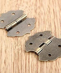 Old School Antique Bronze Vintage Flower Cabinet Door Butt Hinges For 4 Holes With Screws 29 By 31mm on wooden surface