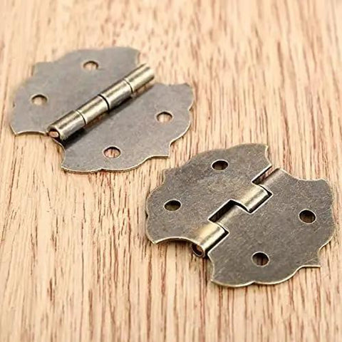 Old School Antique Bronze Vintage Flower Cabinet Door Butt Hinges For 4 Holes With Screws 29 By 31mm on wooden surface