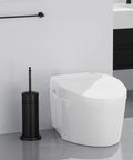Heavy Duty Toilet Plunger With Sturdy Powder Coated Iron Holder For Modern Bathrooms And Beast Mode Suction Rubber Cup That Kicks Nasty Clogs To The Curb In Pure Black Finish next to a sleek white toilet.