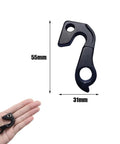 Universal Bicycle Derailleur Hanger With Bolt Black, 55x31mm size, shown in hand for scale, Rear Derailleur Hanger Extender